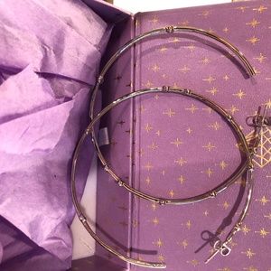 2 Inch silver hoop earrings by Melinda Maria